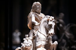 a-statue-of-a-man-riding-a-horse.jpg A statue of a man riding a horse